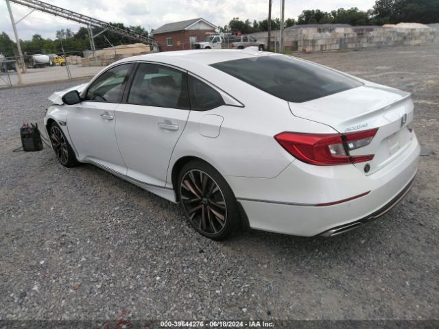 1HGCV2F9XKA000084 Honda Accord Touring 2.0t