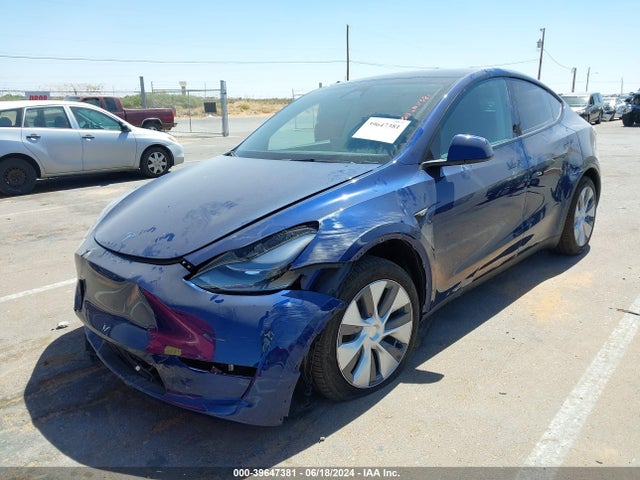 2024 TESLA MODEL Y 7SAYGDEE5RA267465 Photo 1