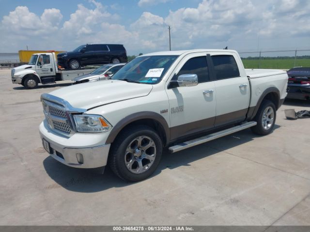 1C6RR7NT3JS104486 RAM 1500 Laramie  4x4 5'7 Box