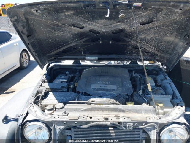 1C4BJWDGXGL311458 Jeep Wrangler Unlimited Sport