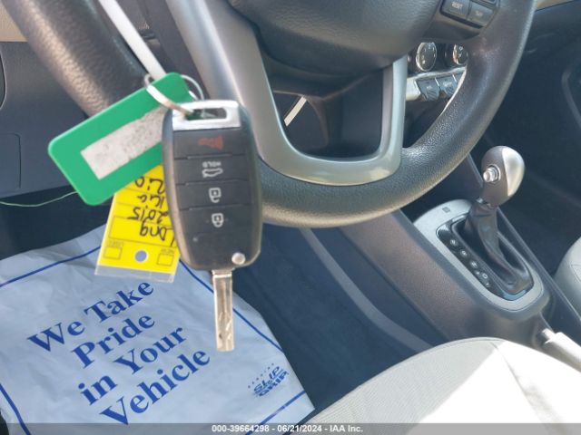 KNADM4A34F6480553 KIA RIO LX