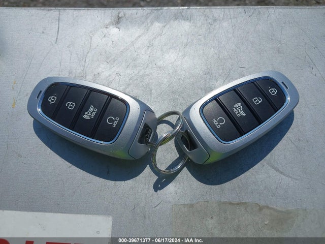 KM8JBCA1XNU050777 Hyundai Tucson Hybrid Blue