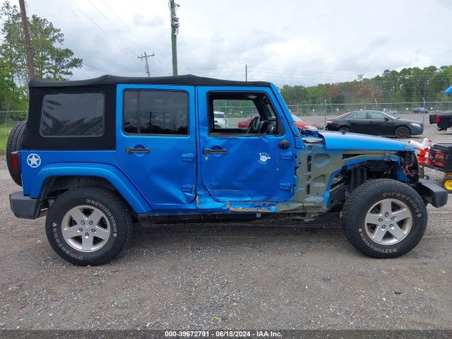 1C4BJWDG5EL161109 Jeep Wrangler Unlimited Freedom Edition