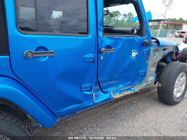 1C4BJWDG5EL161109 Jeep Wrangler Unlimited Freedom Edition