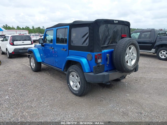 1C4BJWDG5EL161109 Jeep Wrangler Unlimited Freedom Edition