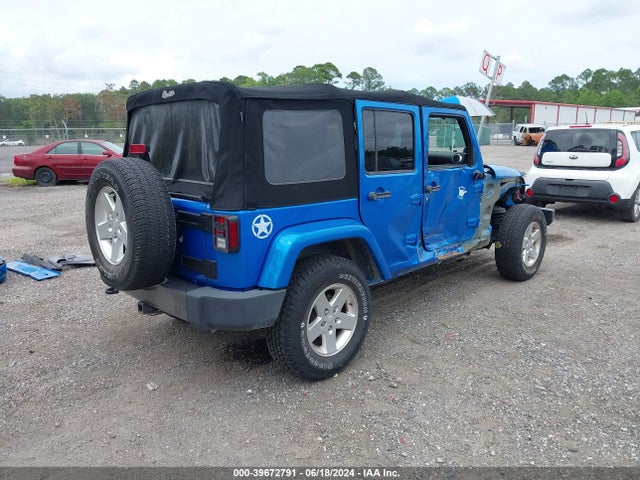 1C4BJWDG5EL161109 Jeep Wrangler Unlimited Freedom Edition
