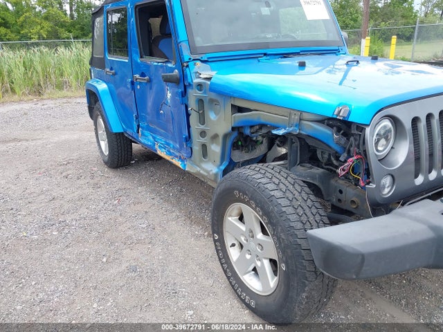 1C4BJWDG5EL161109 Jeep Wrangler Unlimited Freedom Edition
