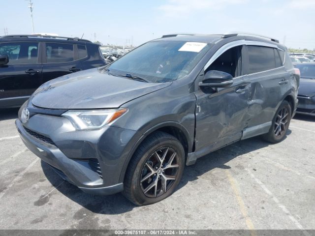 2T3NFREVXGW273336 Toyota RAV4 SE