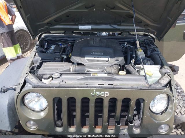 1C4BJWDG9GL145496 Jeep Wrangler Unlimited Sport