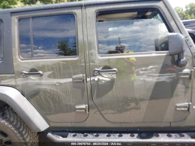 1C4BJWDG9GL145496 Jeep Wrangler Unlimited Sport