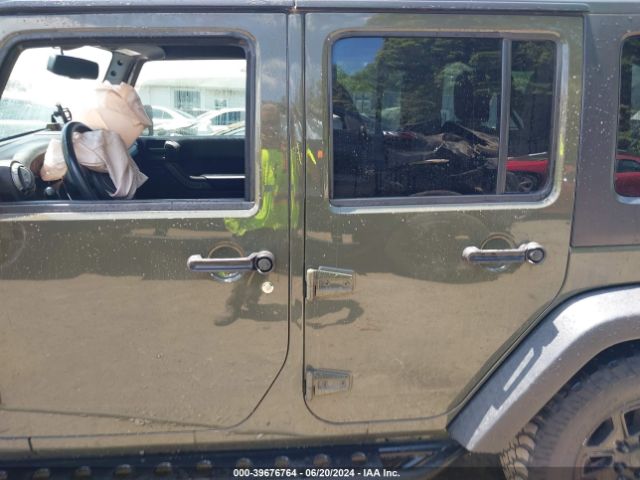 1C4BJWDG9GL145496 Jeep Wrangler Unlimited Sport