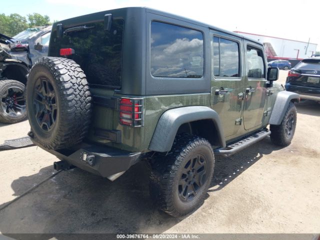 1C4BJWDG9GL145496 Jeep Wrangler Unlimited Sport