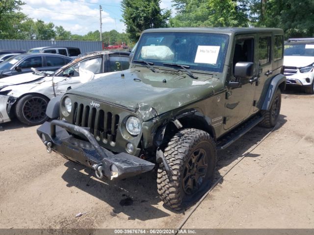 1C4BJWDG9GL145496 Jeep Wrangler Unlimited Sport