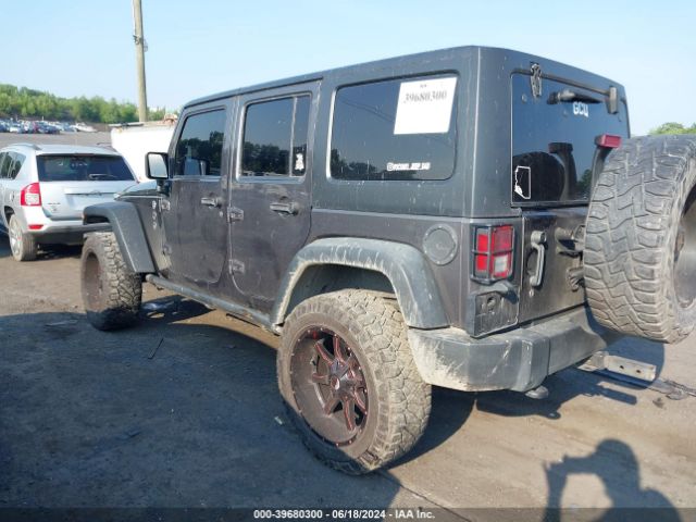 1C4BJWDG8EL180379 Jeep Wrangler Unlimited Sport