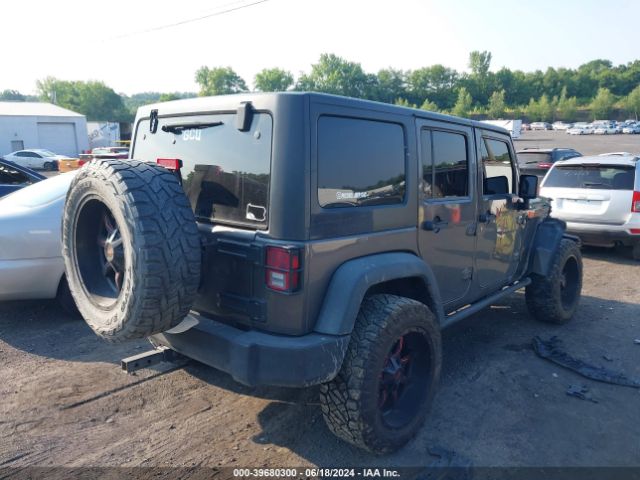 1C4BJWDG8EL180379 Jeep Wrangler Unlimited Sport