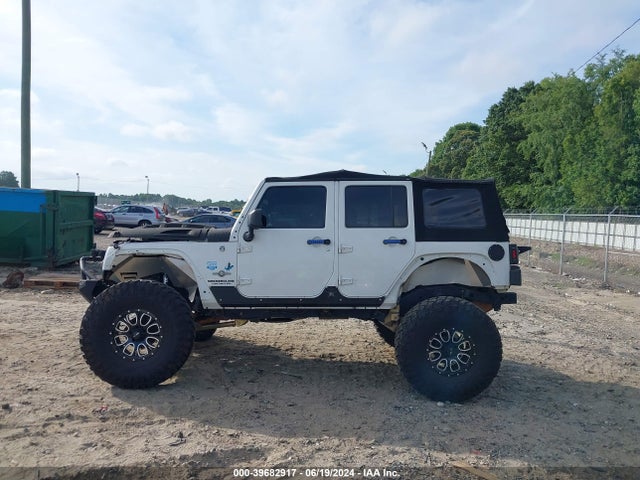 1C4BJWDG4EL187202 Jeep Wrangler Unlimited Freedom Edition