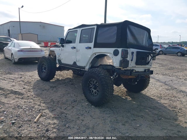1C4BJWDG4EL187202 Jeep Wrangler Unlimited Freedom Edition