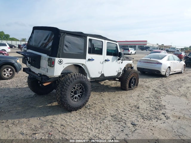 1C4BJWDG4EL187202 Jeep Wrangler Unlimited Freedom Edition