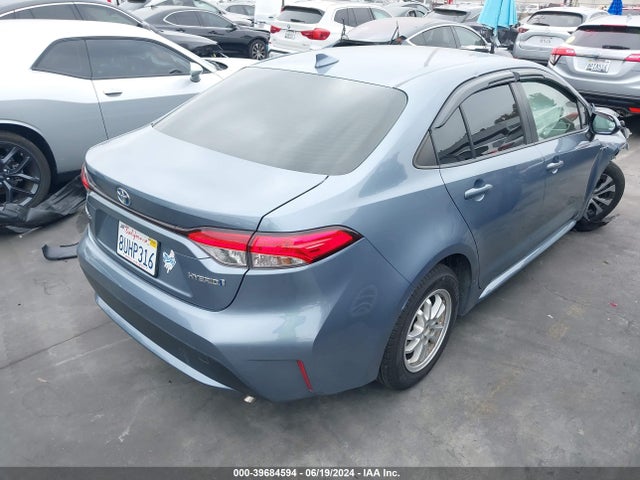 Toyota Corolla Hybrid Le 2021 JTDEAMDEXMJ019770 Image 4