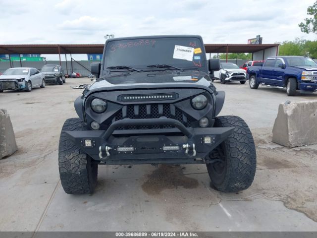 1C4HJWDG5GL196584 Jeep Wrangler Unlimited Sport