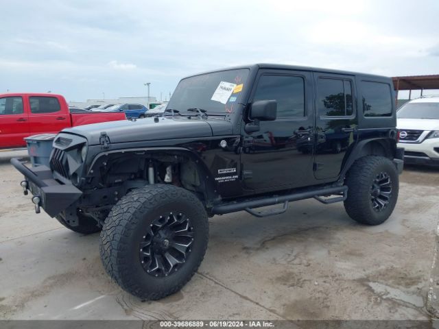 1C4HJWDG5GL196584 Jeep Wrangler Unlimited Sport