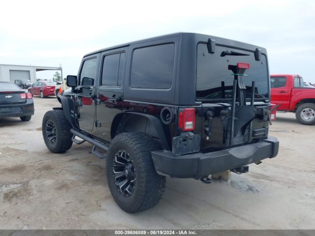 1C4HJWDG5GL196584 Jeep Wrangler Unlimited Sport