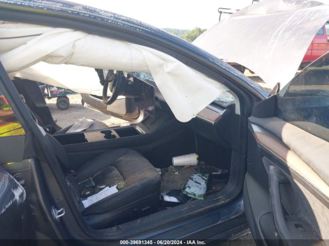 2023 TESLA MODEL 3 5YJ3E1EA5PF664957 Photo 4