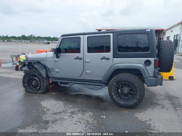 1C4BJWDGXFL509780 Jeep Wrangler Unlimited Sport