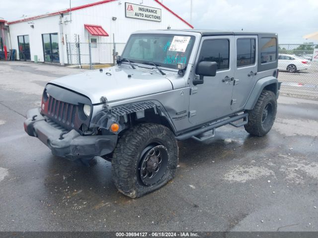1C4BJWDGXFL509780 Jeep Wrangler Unlimited Sport