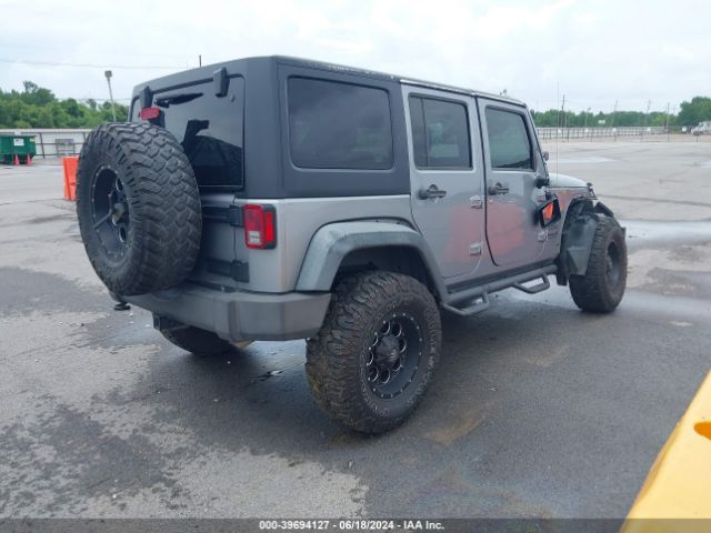 1C4BJWDGXFL509780 Jeep Wrangler Unlimited Sport