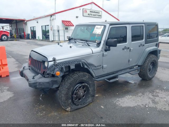 1C4BJWDGXFL509780 Jeep Wrangler Unlimited Sport