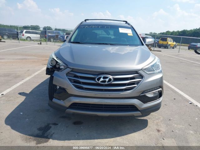 5NMZU3LB9HH026666 Hyundai Santa Fe Sport 2.4l