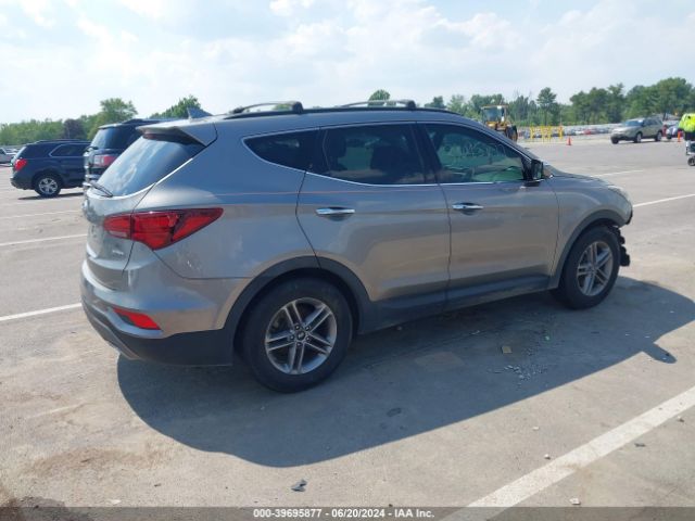5NMZU3LB9HH026666 Hyundai Santa Fe Sport 2.4l