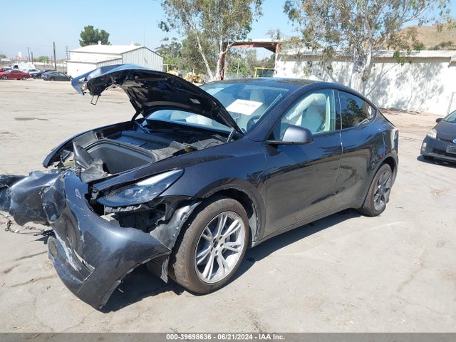 2024 TESLA MODEL Y 7SAYGAEE1RF991798 Photo 1