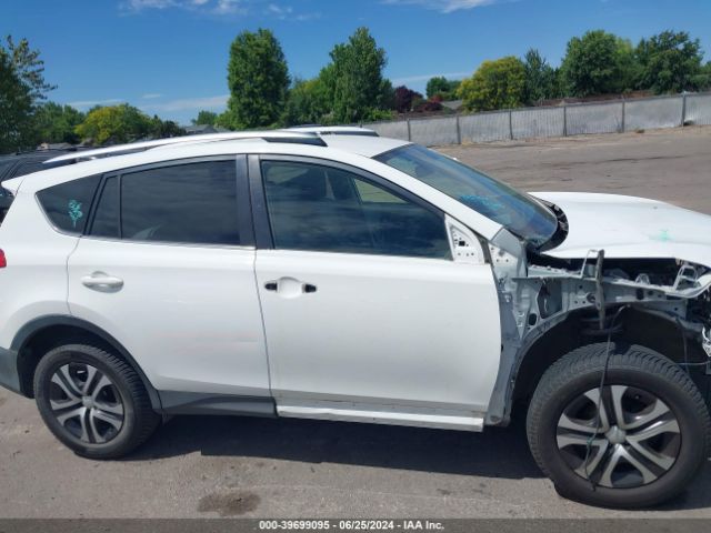 JTMZFREV4EJ004181 Toyota RAV4 LE