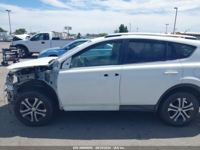 JTMZFREV4EJ004181 Toyota RAV4 LE