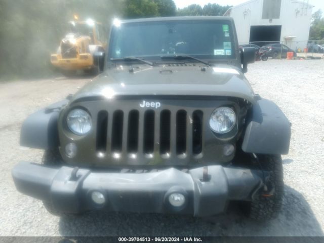1C4BJWDG7FL767772 Jeep Wrangler Unlimited Sport