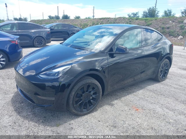 2024 TESLA MODEL Y 7SAYGDED8RF092915 Photo 1