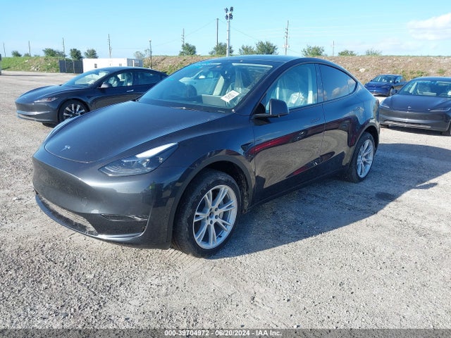 2024 TESLA MODEL Y 7SAYGDED8RF091151 Photo 1