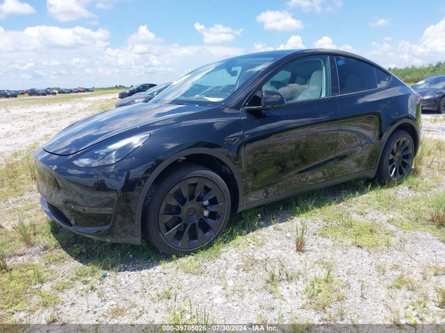 2024 TESLA MODEL Y 7SAYGDED5RF084030 Photo 1