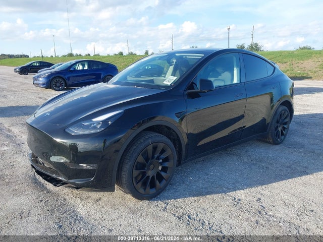 2024 TESLA MODEL Y 7SAYGDED1RF095087 Photo 1