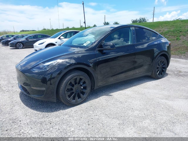 2024 TESLA MODEL Y 7SAYGDED6RF085011 Photo 1