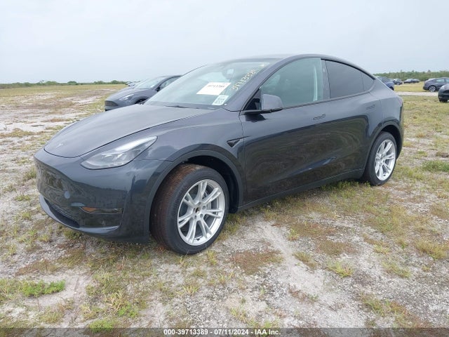 2024 TESLA MODEL Y 7SAYGDED8RF091327 Photo 1