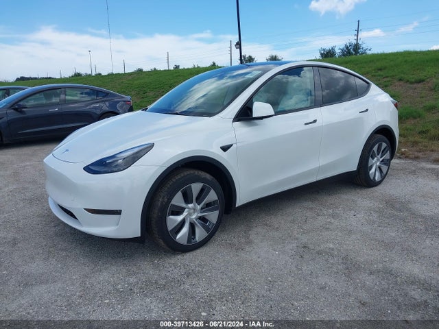2024 TESLA MODEL Y 7SAYGDEE0RA289888 Photo 1