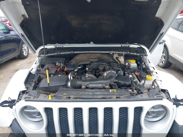 1C4HJXEG4JW135950 Jeep Wrangler Unlimited Sahara 4x4