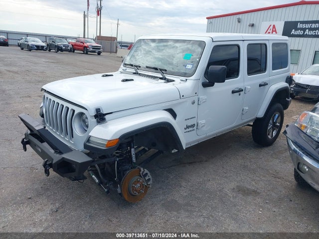 1C4HJXEG4JW135950 Jeep Wrangler Unlimited Sahara 4x4