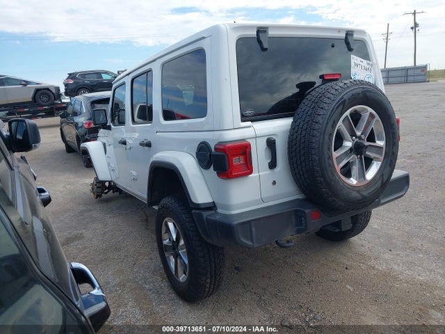 1C4HJXEG4JW135950 Jeep Wrangler Unlimited Sahara 4x4