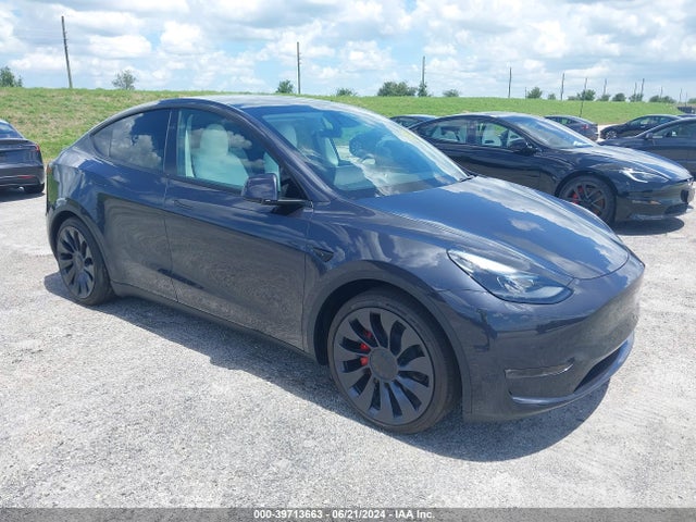 2024 TESLA MODEL Y 7SAYGDEF1RA275409 Photo 0