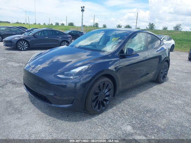 2024 TESLA MODEL Y 7SAYGDEF1RA275409 Photo 1