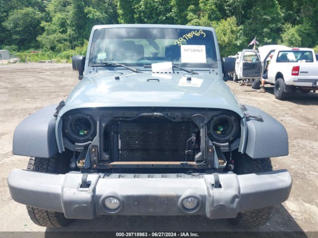 1C4AJWAG9FL710988 Jeep Wrangler Sport
